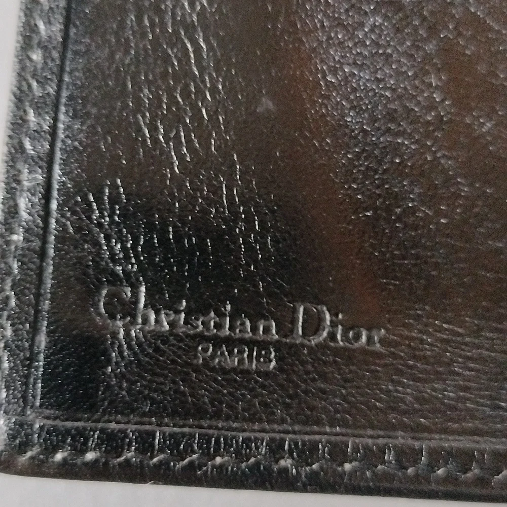 Christian Dior Vintage black leather wallet.